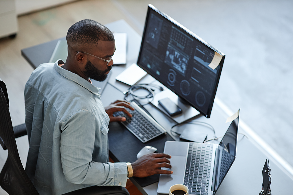 This picture depicts a gentleman working on a computer
Security and Technology